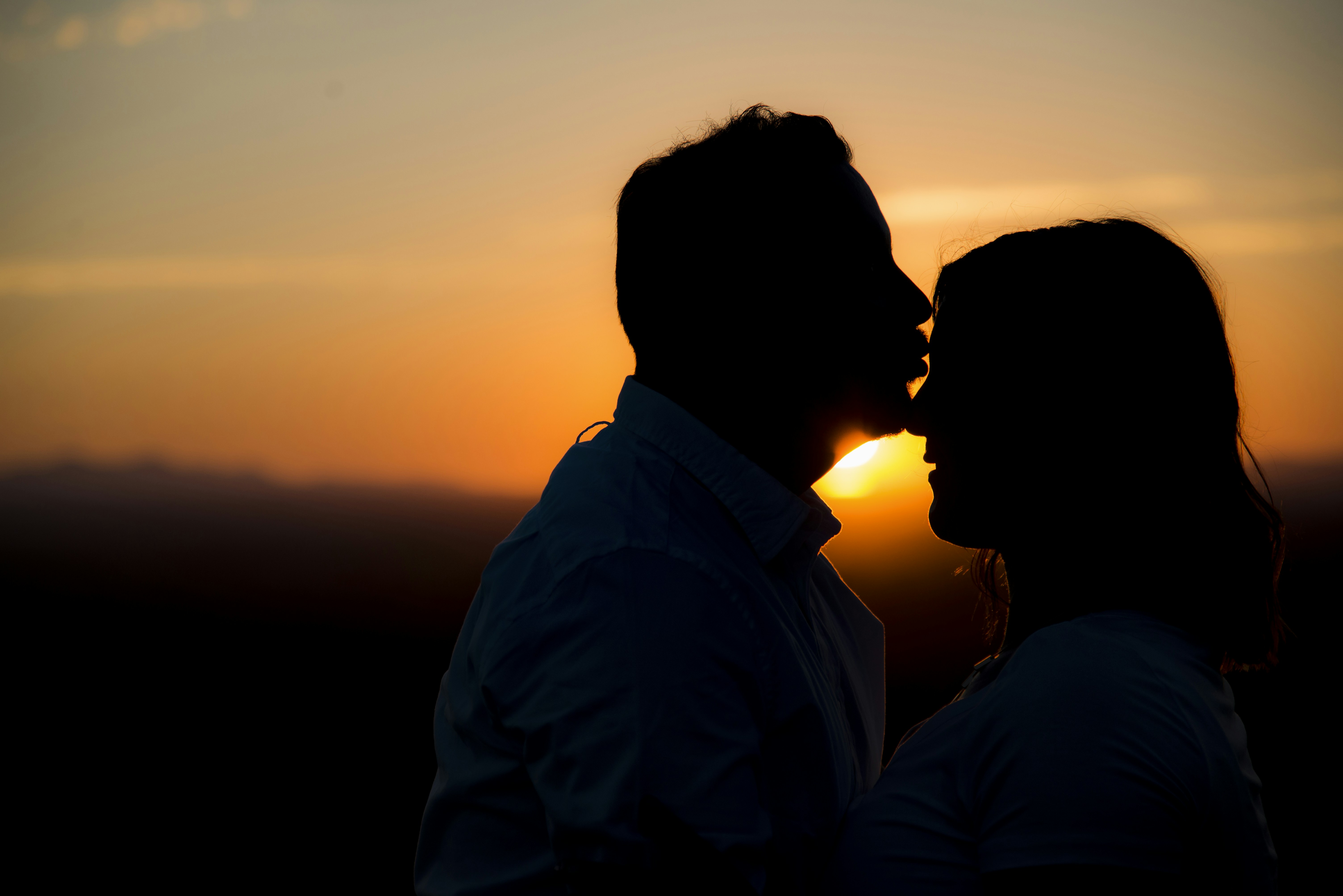 Silhouette of man kissing woman's forehead photo – Free Woman Image on  Unsplash, image size:3000x2003