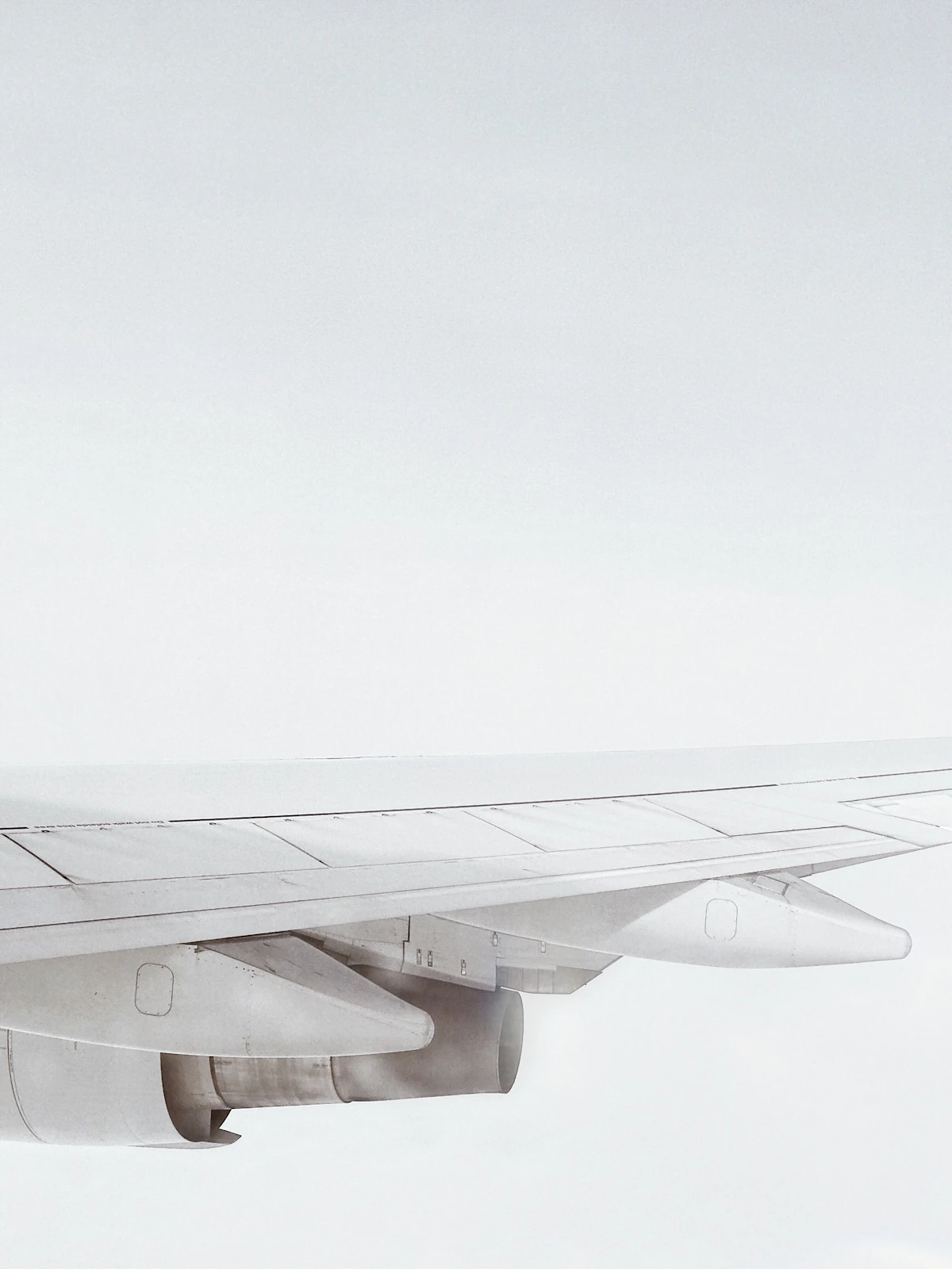 Airplane wing seen from a window in flight