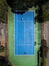 two men playing tennis