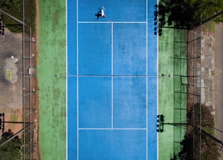 two men playing tennis