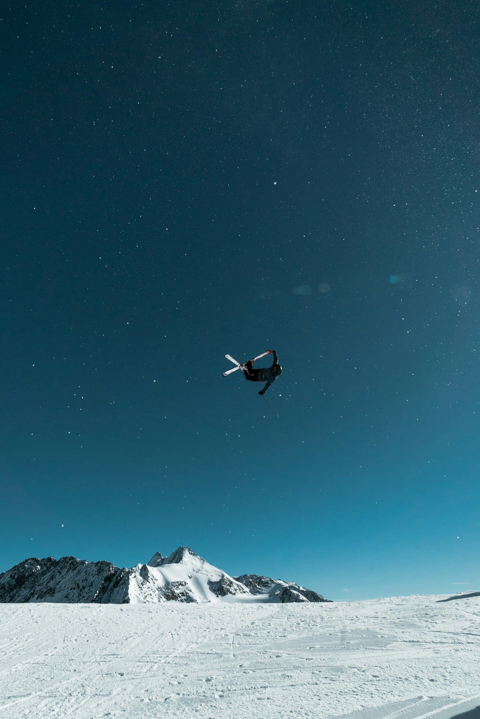 Samyang AF 14mm F2.8 FE sample photo. Person performing snow ski photography