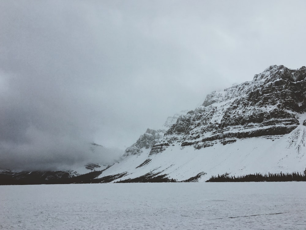 selective focus photography of mountain cover of snow