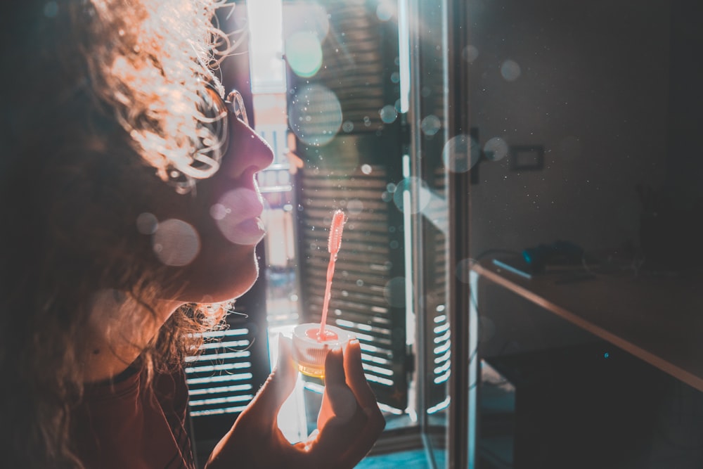 woman making bubble