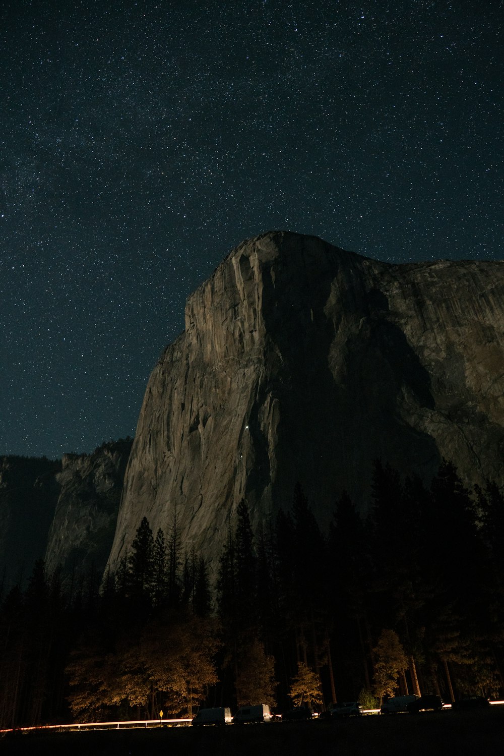 brown mountain cliff with starry sky