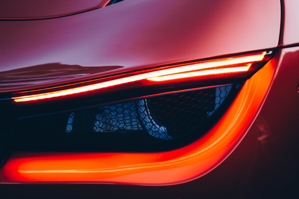 a close up of the tail lights of a sports car