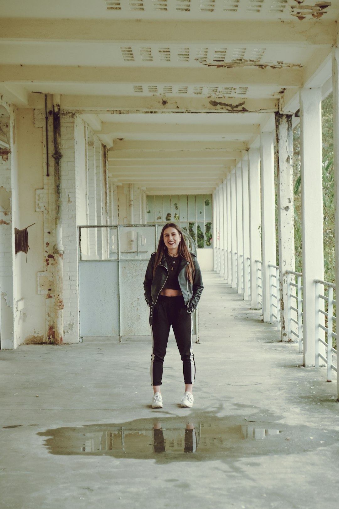 woman wearing black and white track pants during daytime