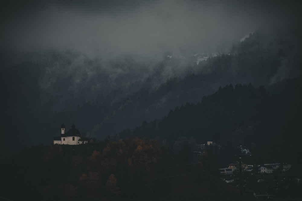 aerial photo of village during cloudy day