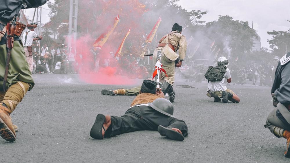 group of men in the middle of road