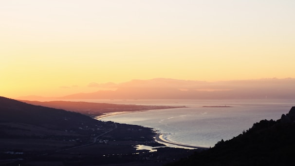 A scenic view of the coastline in Tumbes during sunset.