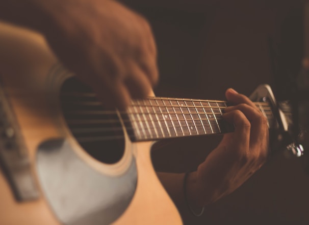 person playing guitar