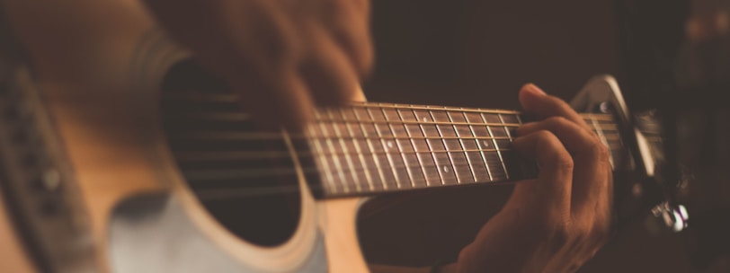 person playing guitar