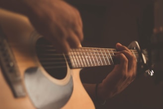 person playing guitar