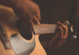 person playing guitar