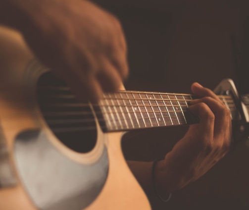 person playing guitar