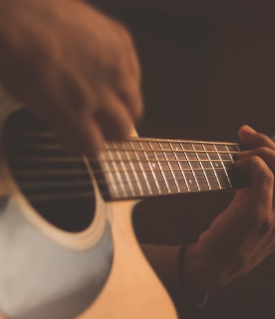 person playing guitar