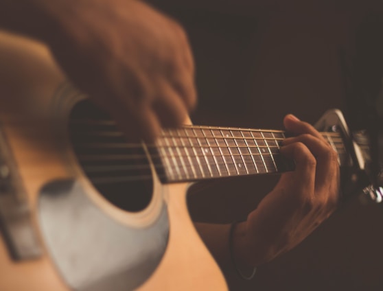 person playing guitar