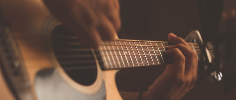 person playing guitar