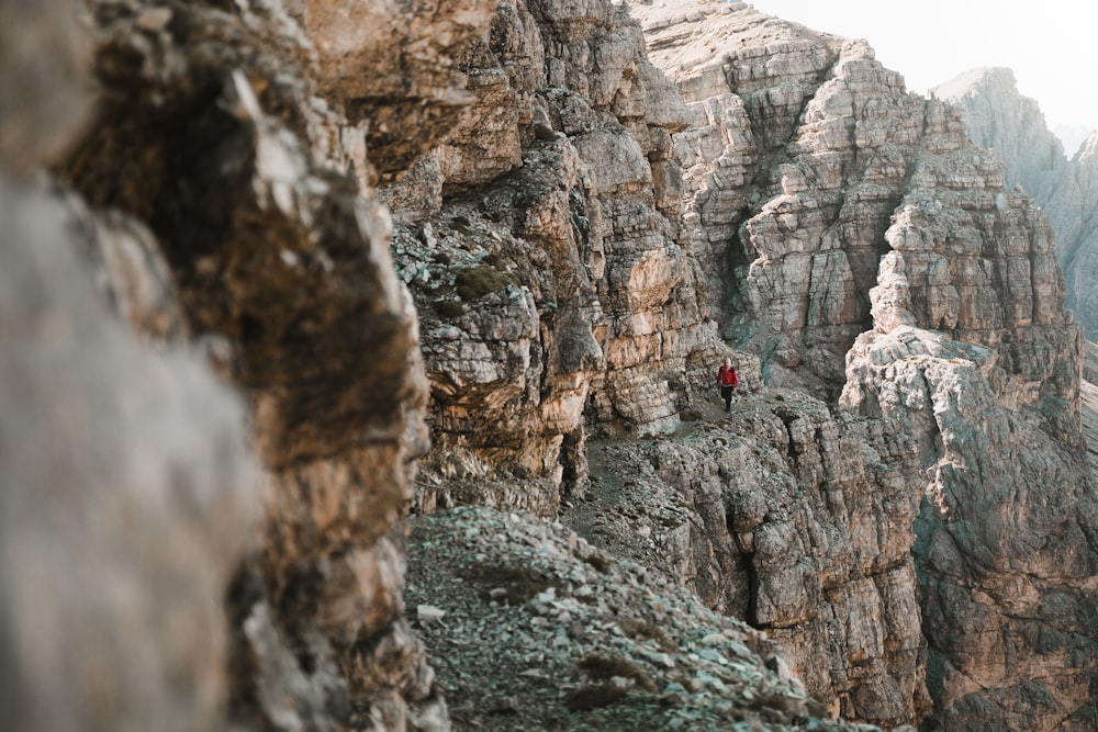 person in mountain edge