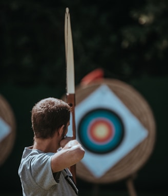 white and brown composite bow