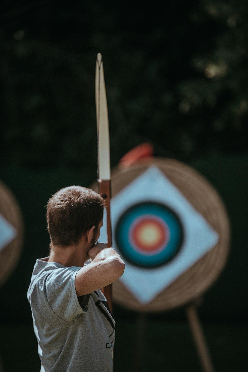 white and brown composite bow