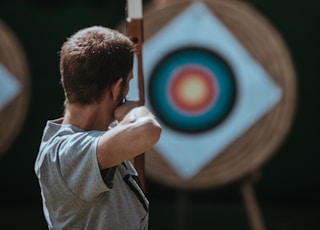 white and brown composite bow