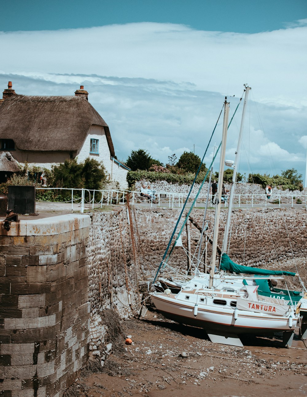 white yacht on brown land