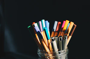 pencil and pencil on container