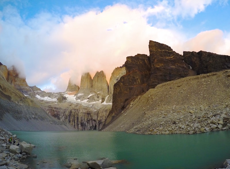 Torres del Paine granite towers at sunrise with glacial lake