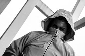 A black hoodie with a high collar, perfect for blending into shadows.