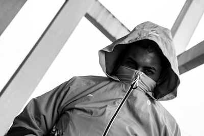 A black hoodie with a high collar, perfect for blending into shadows.