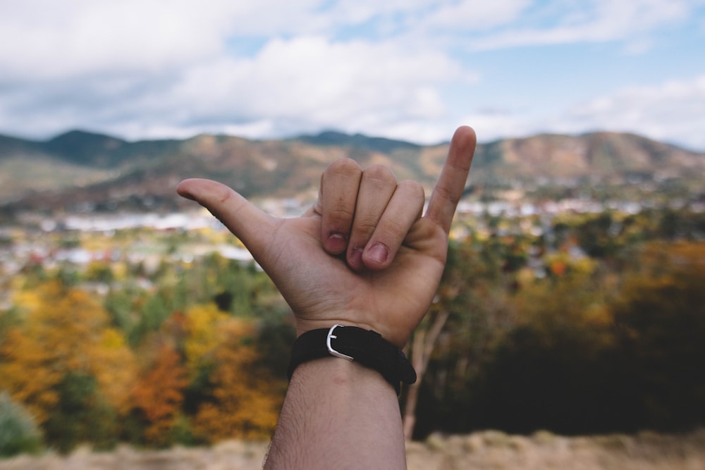 person rock hand signage