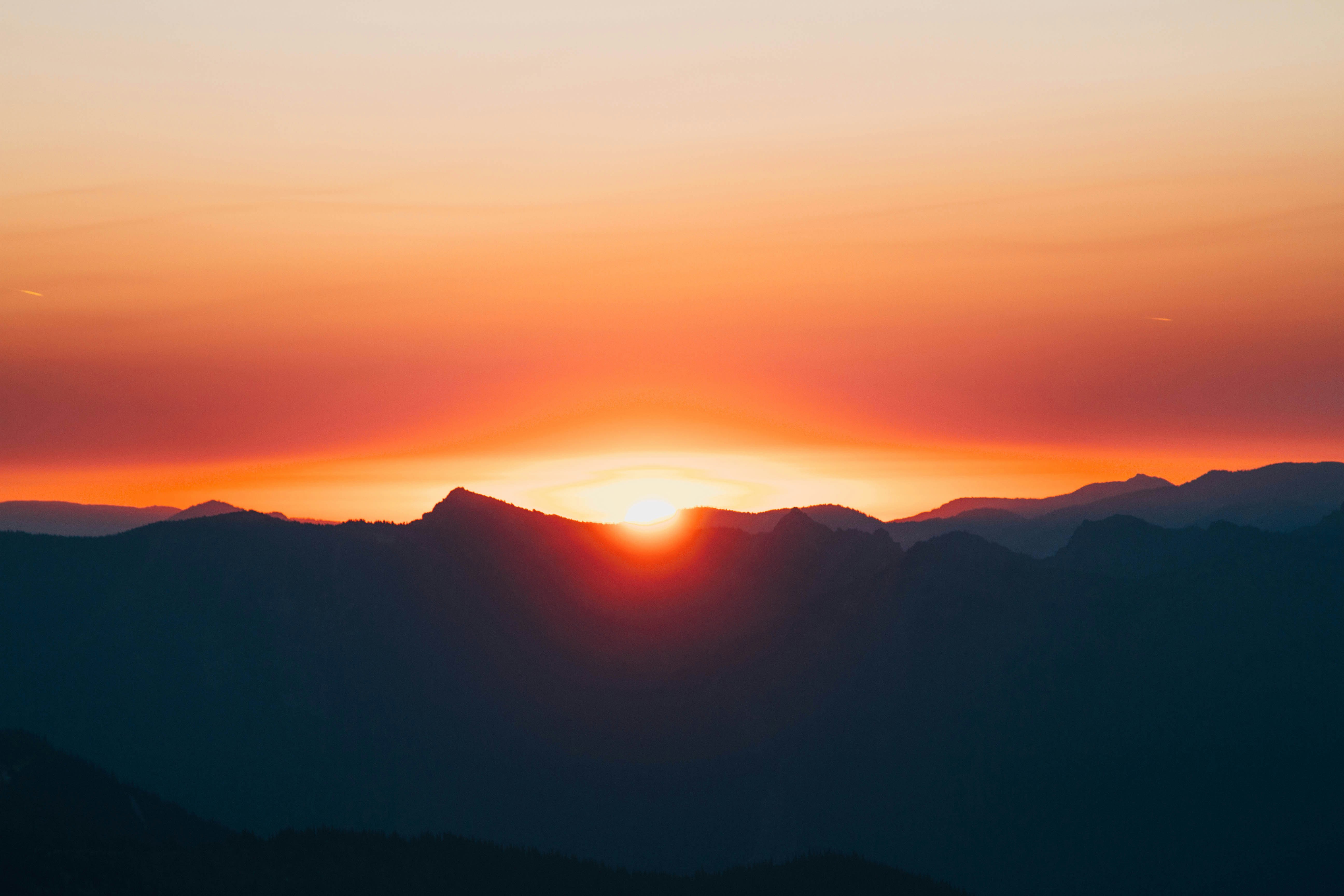 silhouette of mountains during golden hour