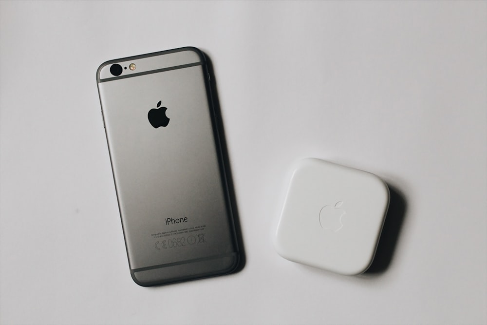 flat lay photography of space gray iPhone 6