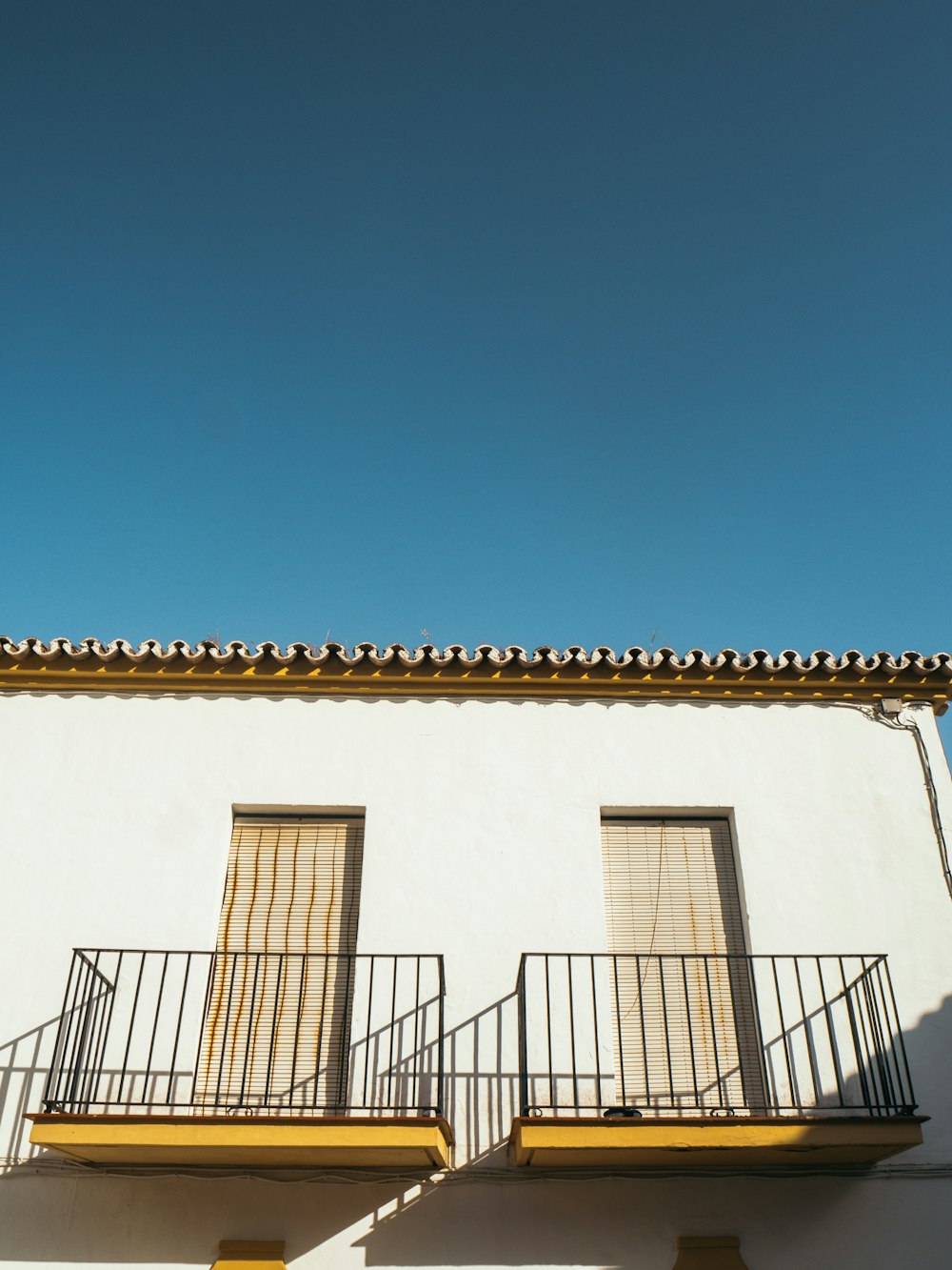 low-angle photo of white concrete building