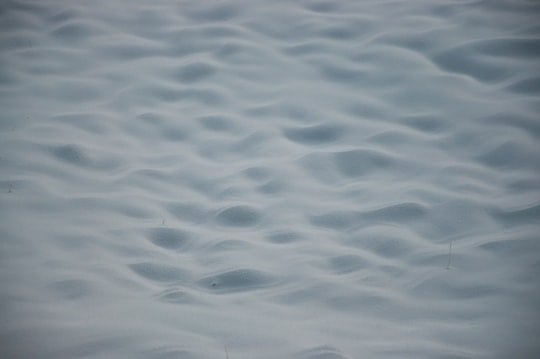 white snow in Lake of Carezza Italy