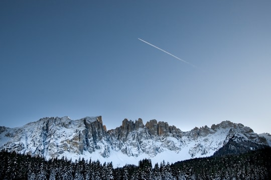 landscape photo of mountain covered with snow in Karersee Italy