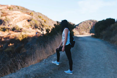 woman wearing black leggings standing