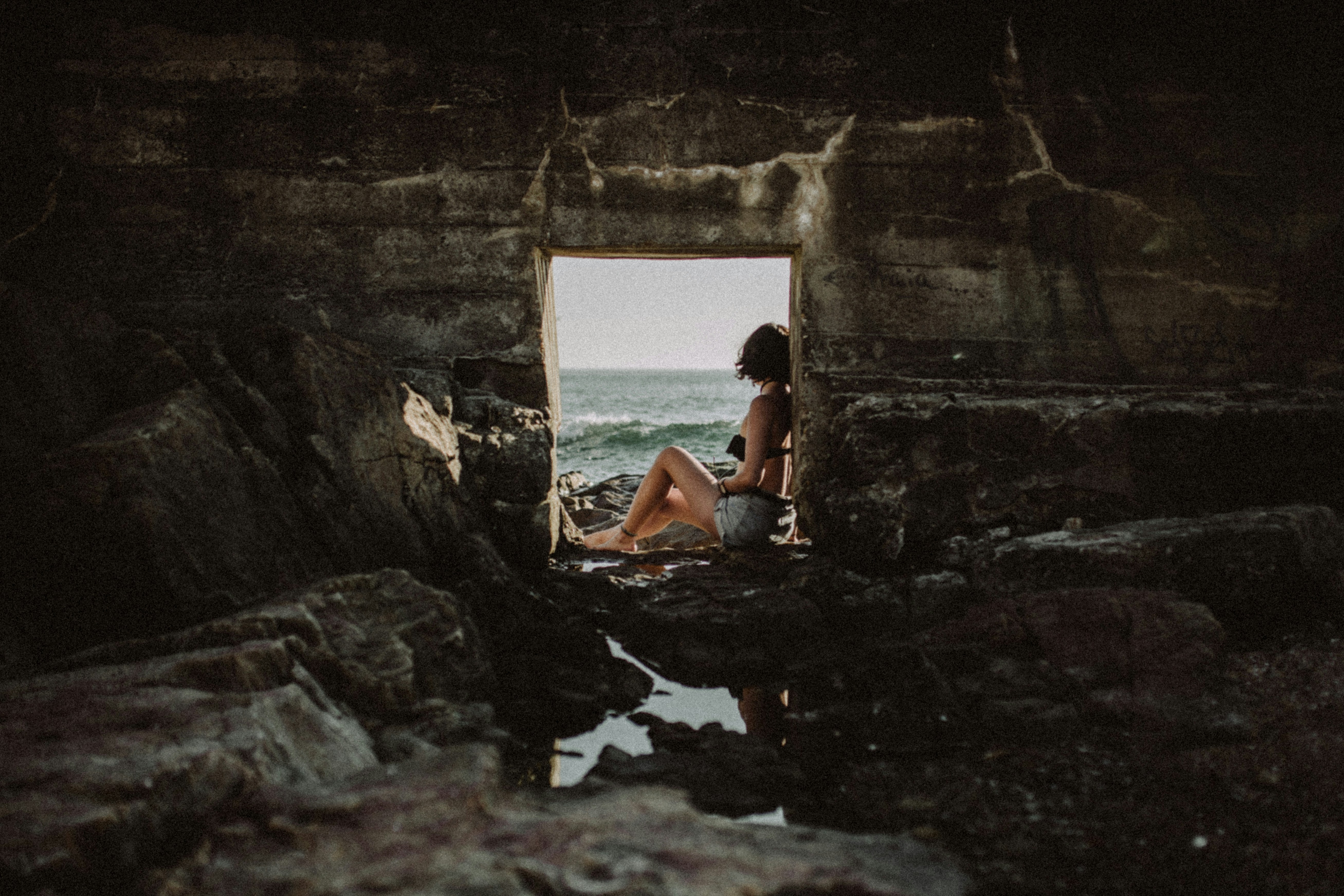 woman sitting inside cave, Don’t live a life full of plans. Sometimes the greatest moments happen unplanned. And the greatest occur from not reaching what is planned.