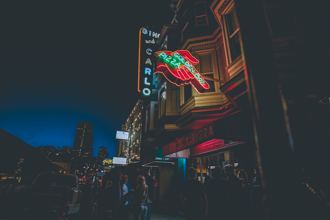 Calro neon signage under black sky