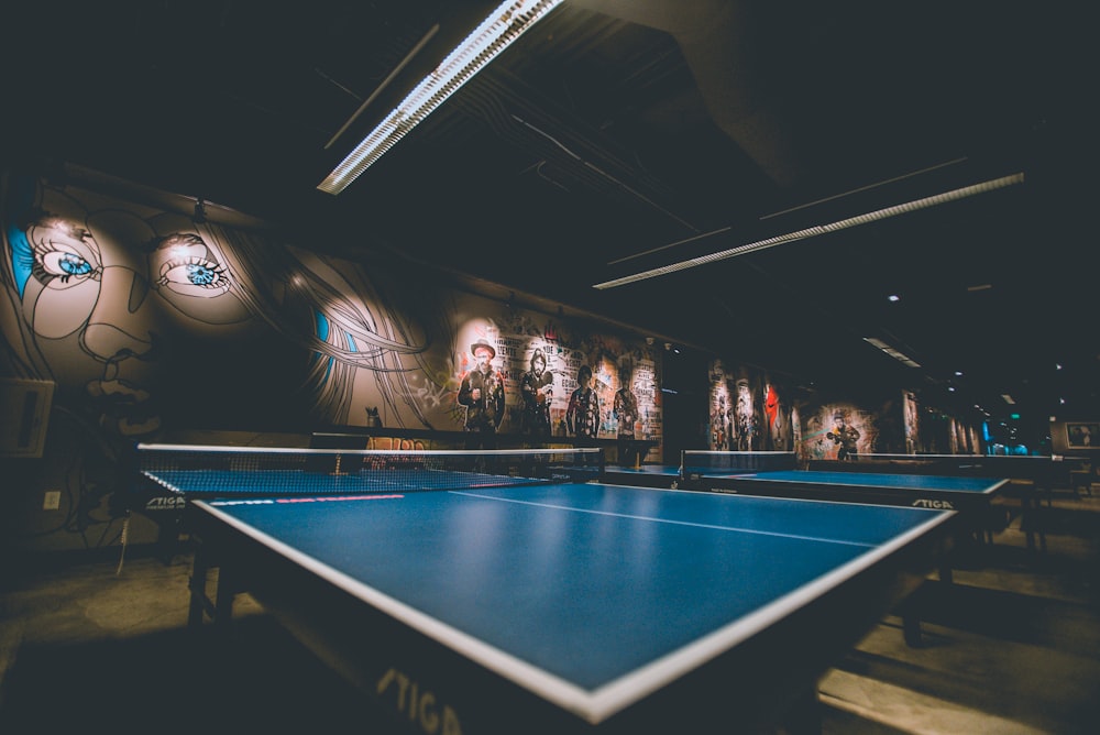 selective focus of blue ping-pong table