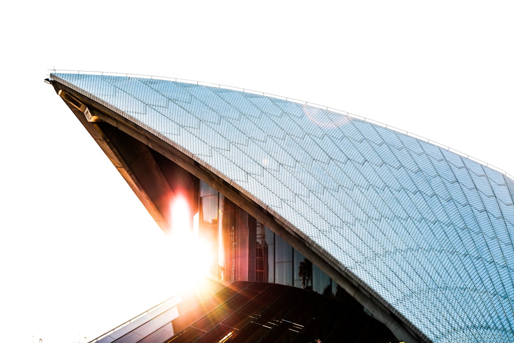 the sun is shining through the glass of a building