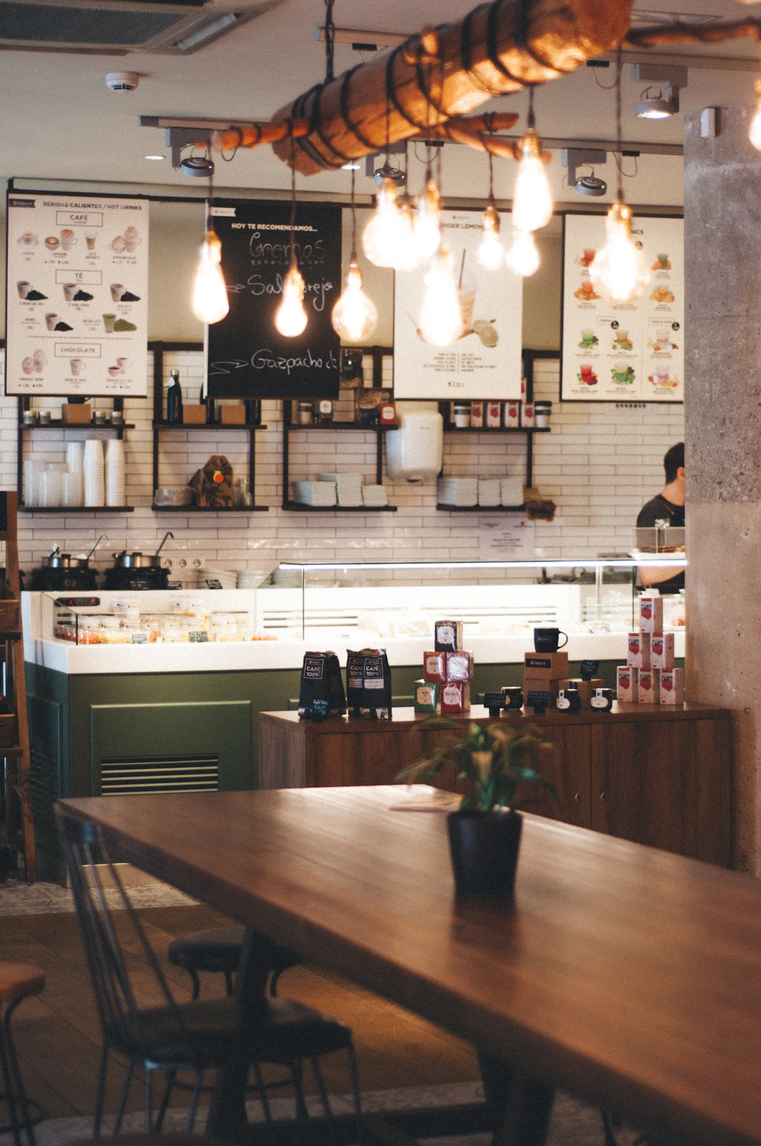 Barista working at a modern espresso bar