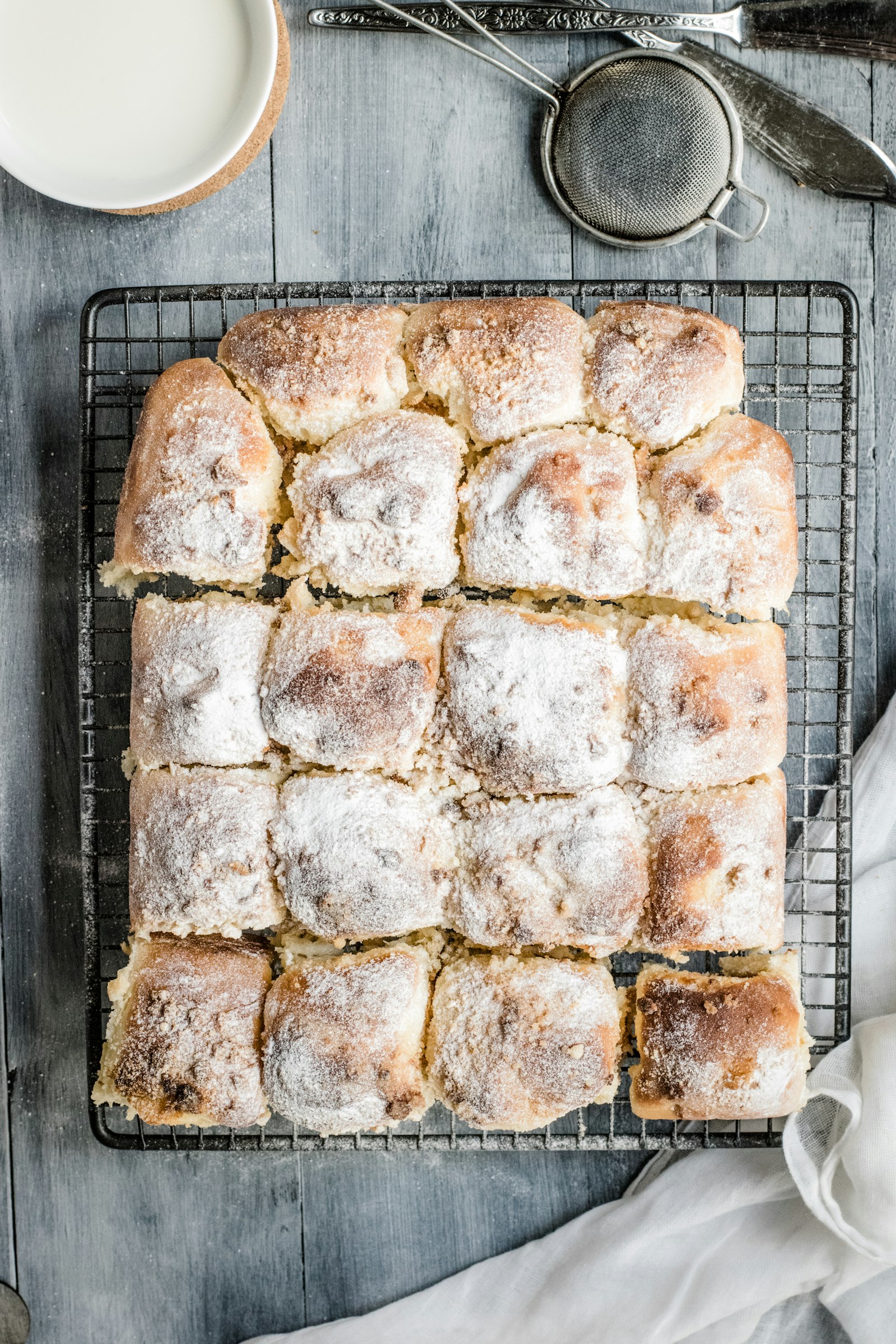 Nikon D5300 + Nikon AF-S Nikkor 50mm F1.8G sample photo. Baked bread on gray photography