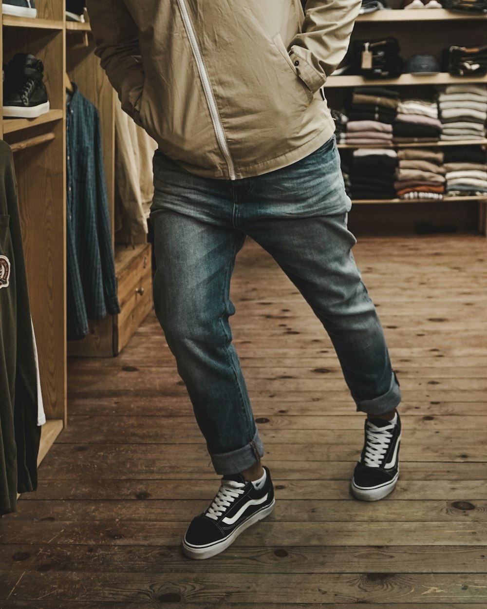 man wearing distressed black denim fitted jeans and pair of black Vans Old  Skool shoes photo – Free Morocco Image on Unsplash