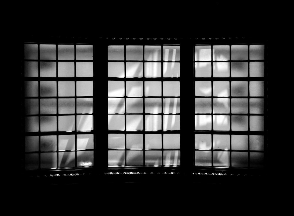 a black and white photo of a window