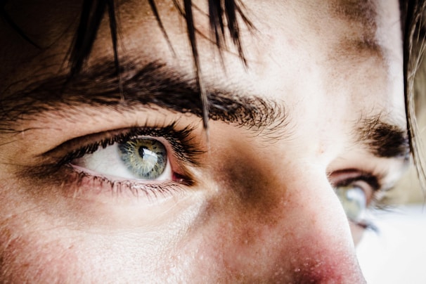 A sharp, close-up shot highlighting intricate details of a subject’s eyes.
