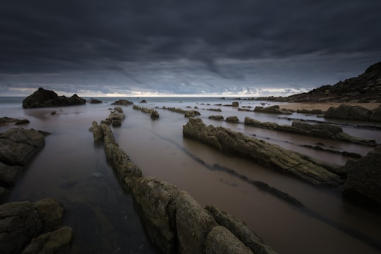 rock formation on body of water in Barrika Spain