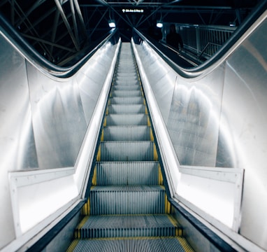 time lapse photo of escalator