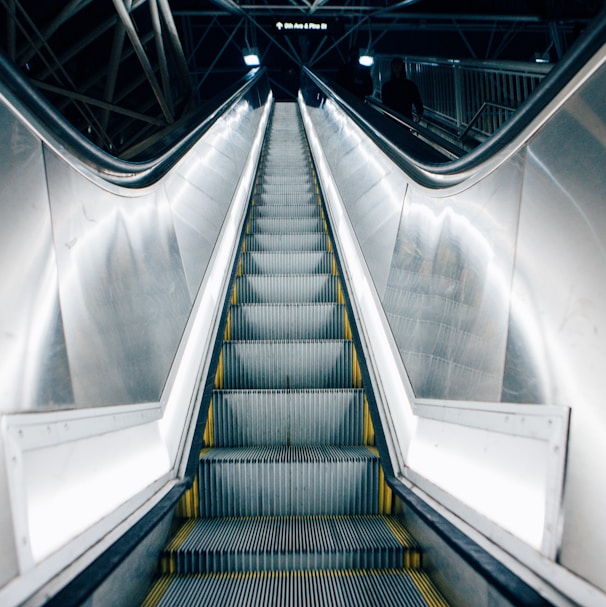time lapse photo of escalator
