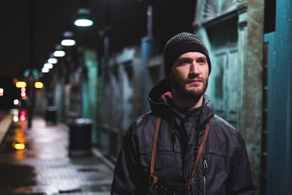 man standing on walkway